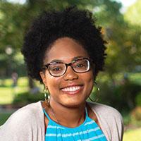 Celeste Malone poses for photo outside MUC